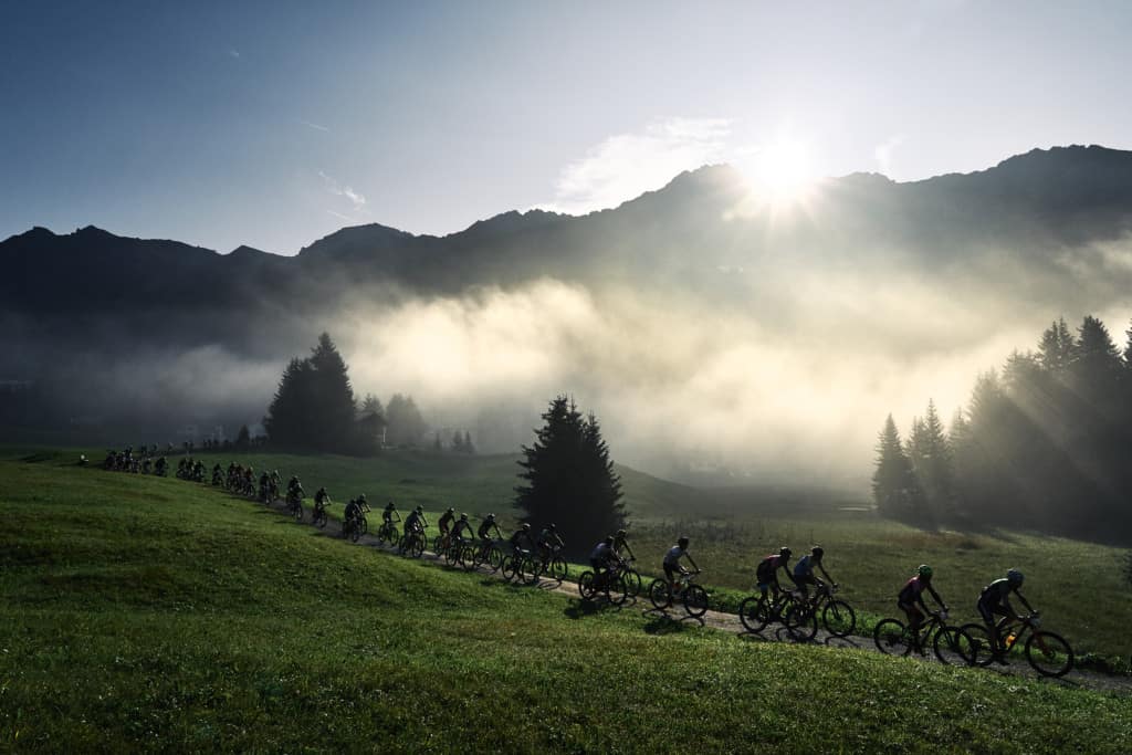 riders in early morning fog